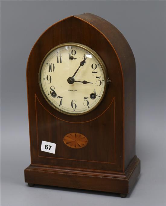 An Edwardian shell inlaid mantel clock